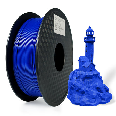 Spool of blue filament and a 3D printed lighthouse model on a white background