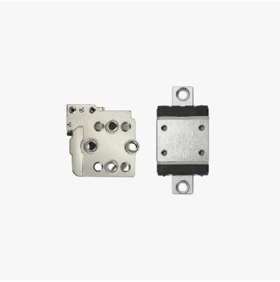 Two metal components on a white background