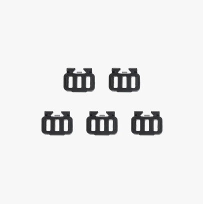 Set of five black rectangular clips on a white background