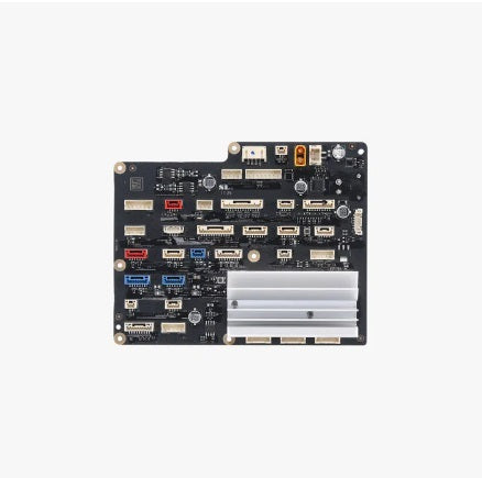Computer motherboard with various ports on a white background