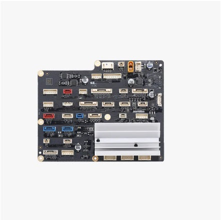 Electronic circuit board with various components on a white background