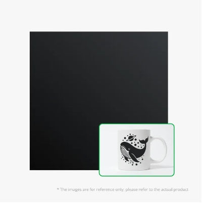 Black square mat with a white mug featuring a whale design on a light gray background.