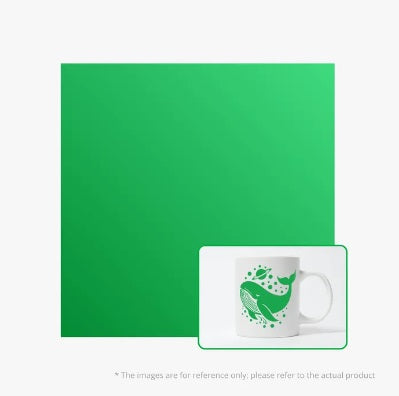 Green placemat and white mug with green design on a white background