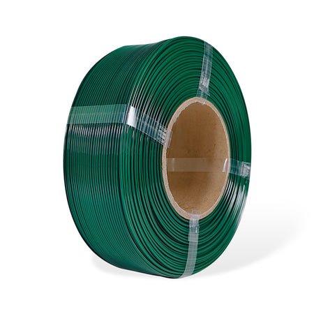 Roll of forest green filament on a white background