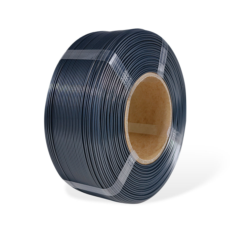 Roll of graphite filament on a white background