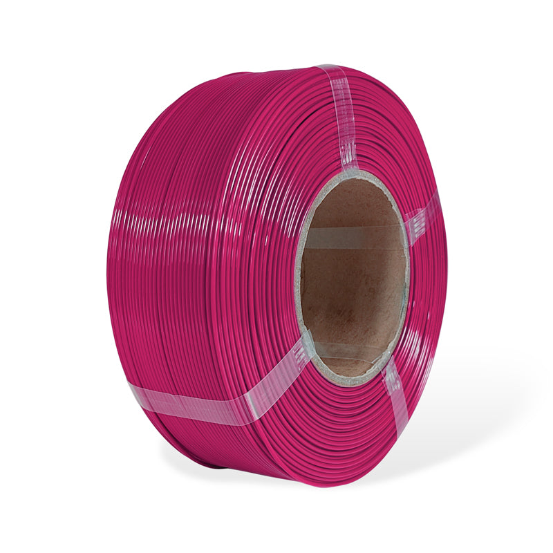 Roll of maroon filament on a white background
