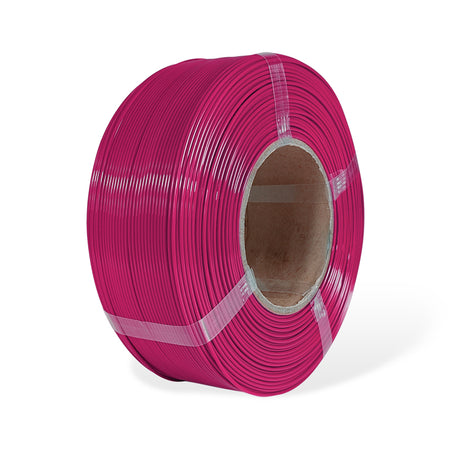 Roll of maroon filament on a white background