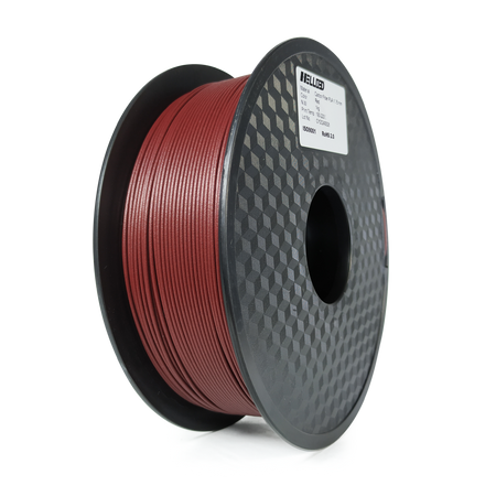 Spool of red filament on a white background