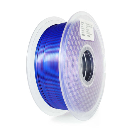 Spool of blue filament on a white background
