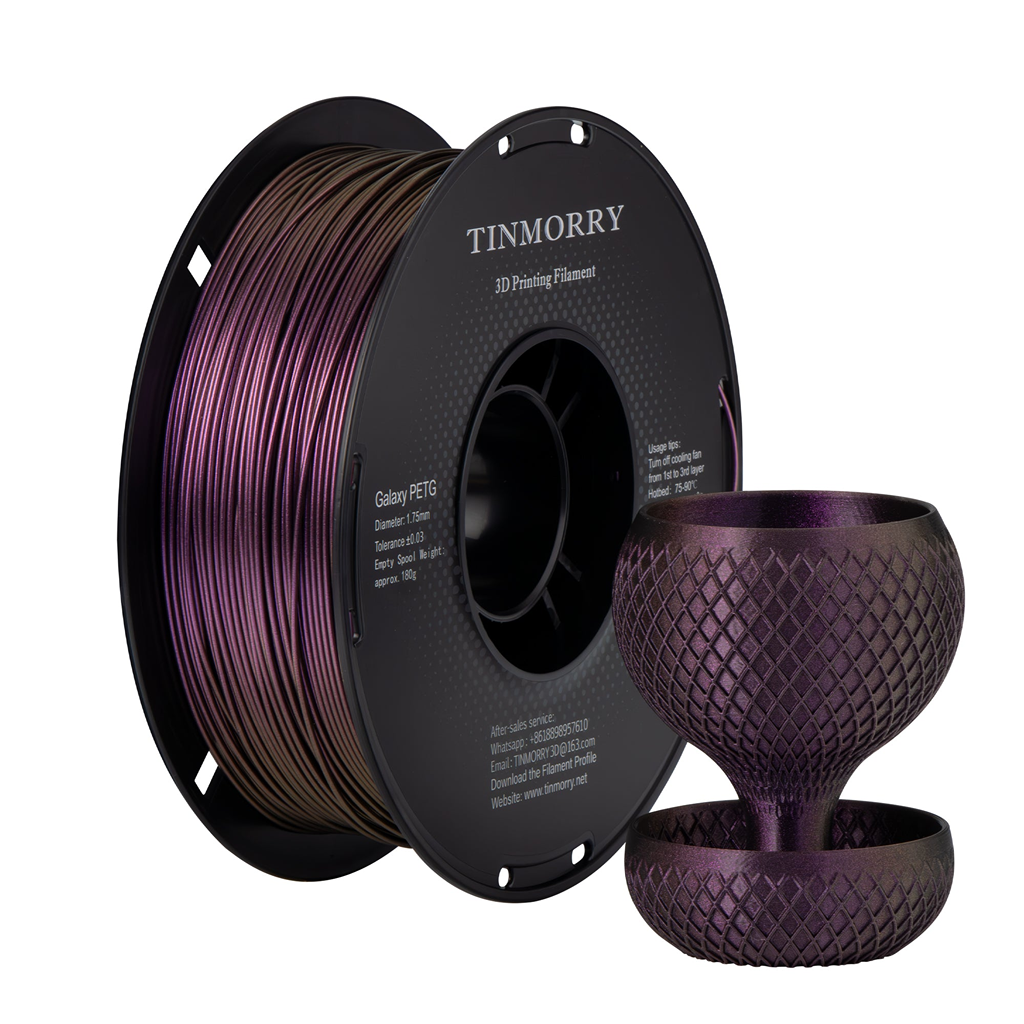 Spool of Tinmorry 3D printing filament with a printed purple object on a white background