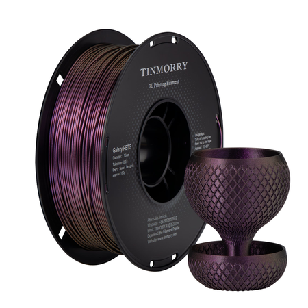 Spool of Tinmorry 3D printing filament with a printed purple object on a white background