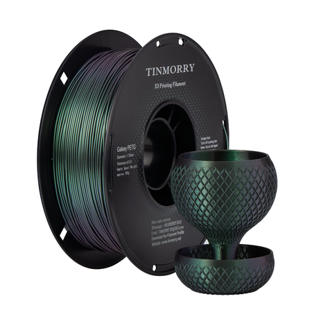Spool of TINMORRY 3D printing filament with a printed green object on a white background