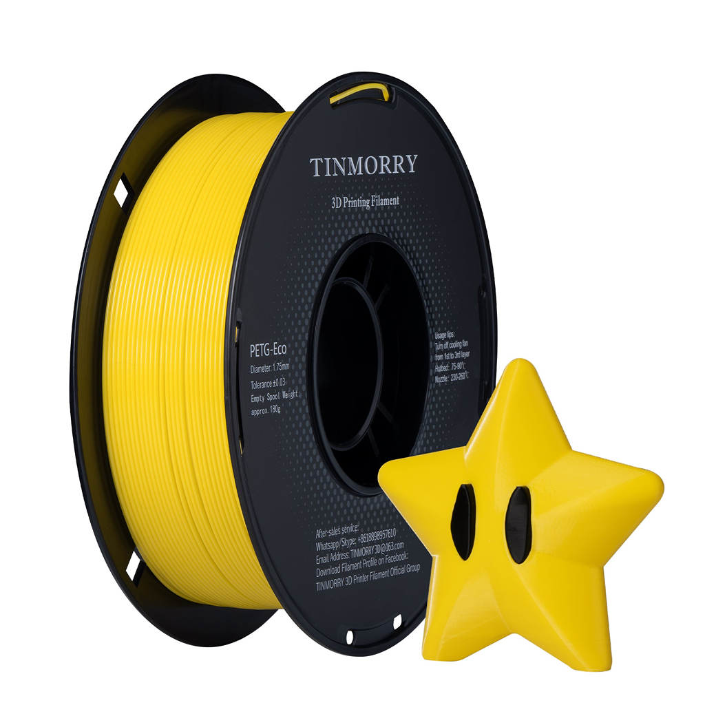 A spool of yellow 3D printing filament with a black label reading TINMORRY, shown next to a small yellow star-shaped object on a plain white background.