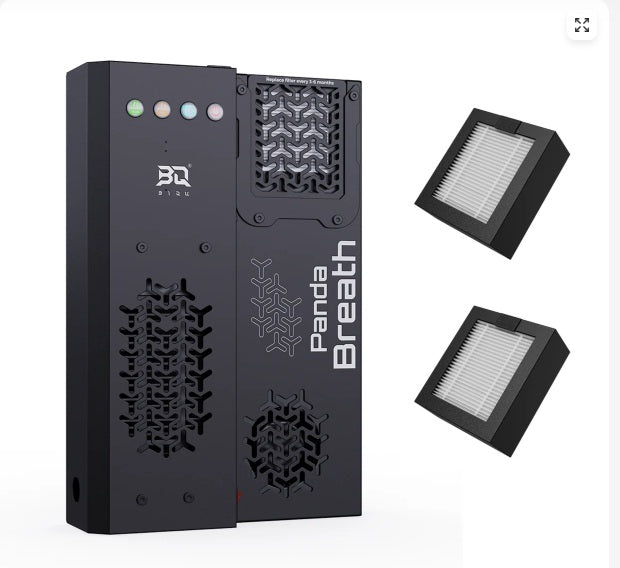 Black air purifier with filters on a white background