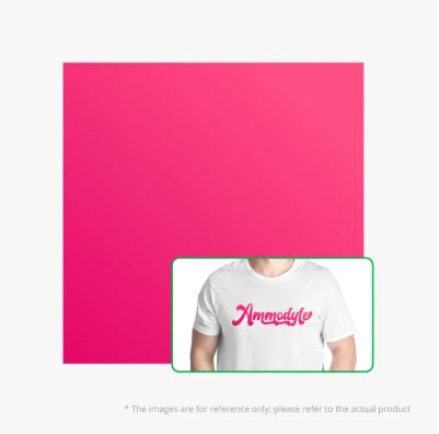 Person wearing a white t-shirt with 'Kamodyle' logo against a pink background