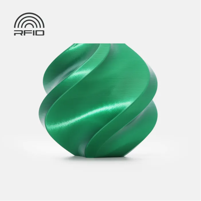 Green metallic object with RFID logo on a light gray background