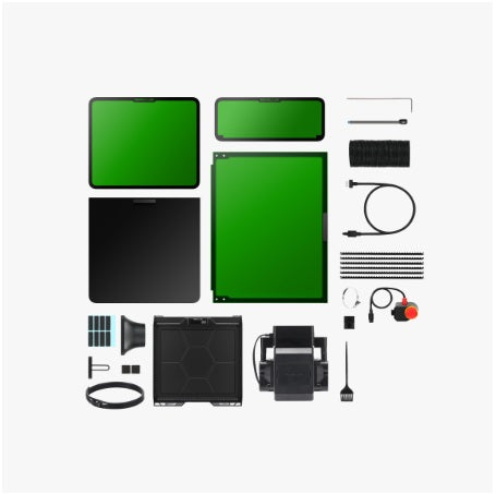 Collection of green and black electronic components on a white background